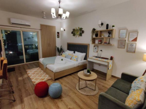 SOJOURN STAYS- Elegant Studio Apartment.